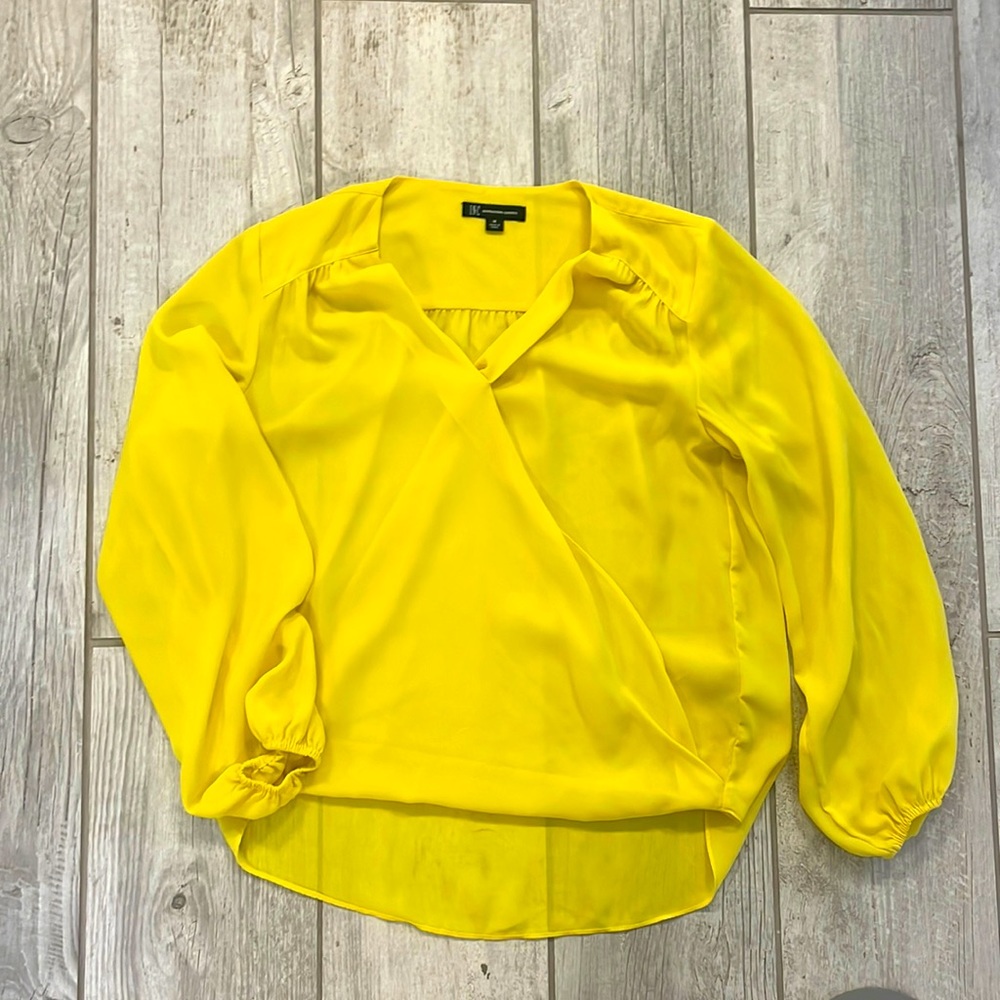 Stunning yellow cross over blouse by INC. Perfect for Spring & Summer.